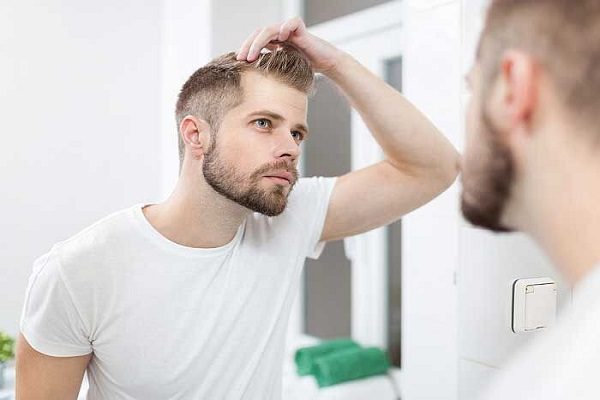 علت ریزش مو در مردان ودرمان آن